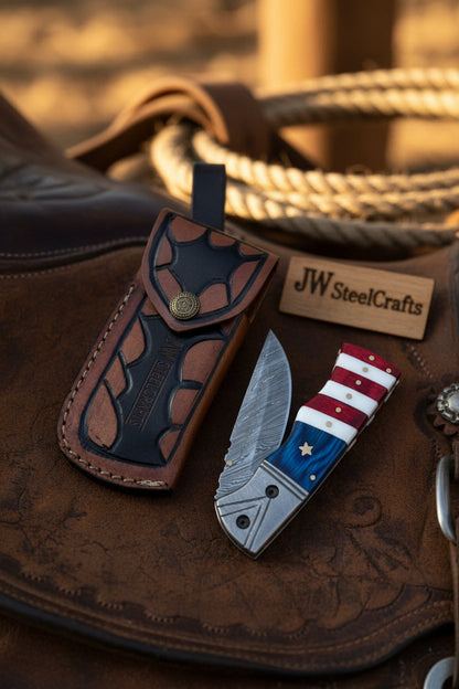 Patriot Damascus Folding Knife 7” opened – American Flag Handle with Leather Sheath
