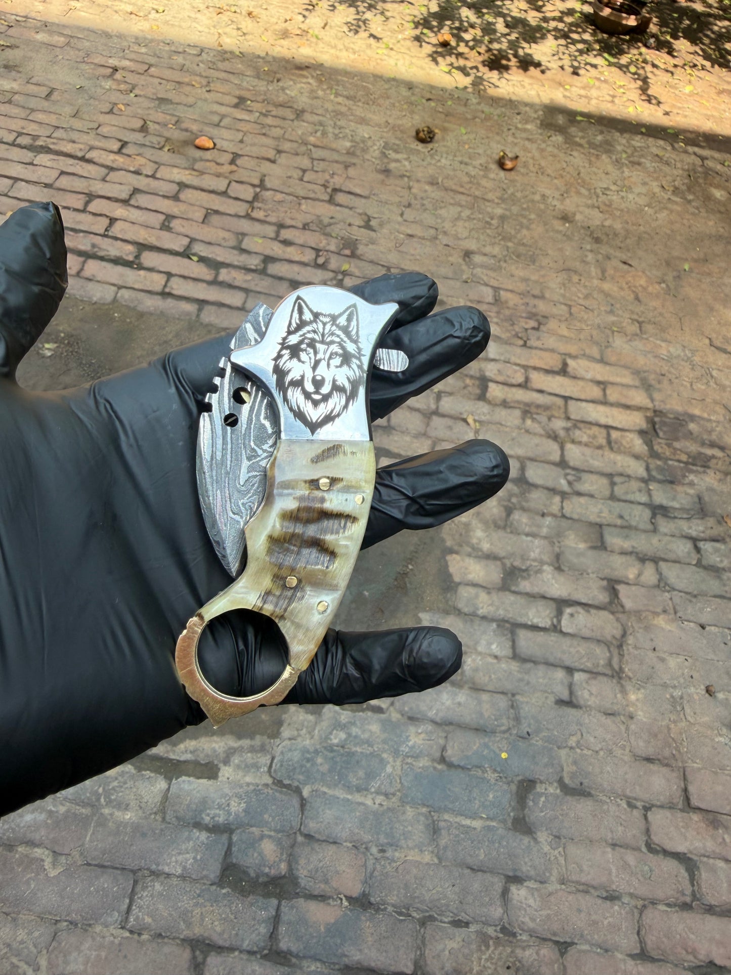 Wolf Claw Damascus Folding Karambit with Engraved Wolf Bolster&nbsp;