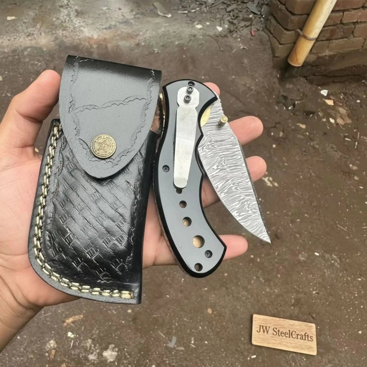 Damascus Steel Folding Pocket Knife — Recurve Clip Point Blade, Black Resin Handle, Pocket Clip & Cowhide Leather Sheath