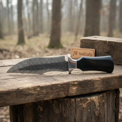 Damascus Trailing Point Fixed Blade Hunting Knife — Forged Ladder Pattern Blade, Black Resin Handle & Steel Guard