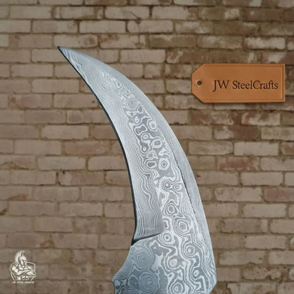 Karambit Knife with Black horn and Stainless steel handle.